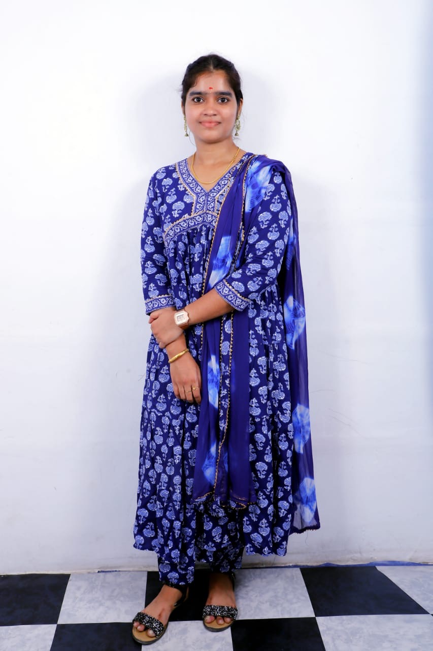 Dr . Veda Vigneswari